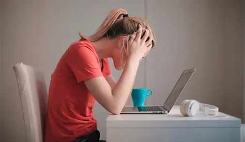 Woman Stress on Laptop